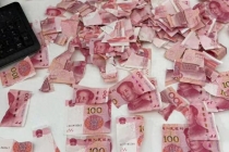 4100元现金被撕成400张碎片 银行5小时耐心复原
