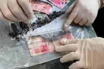 26万现金被烧毁 银行清点7小时兑换 温情服务感动客户